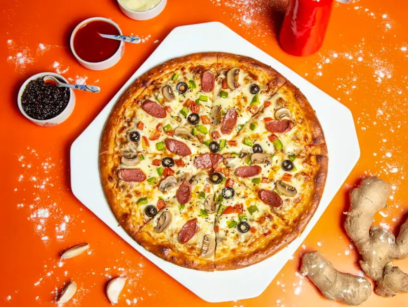 pizza with cheese and green leaf | Photo by Shourav Sheikh, on https://unsplash.com/@shouravsheikh?utm_source=CentralApp&utm_medium=referral